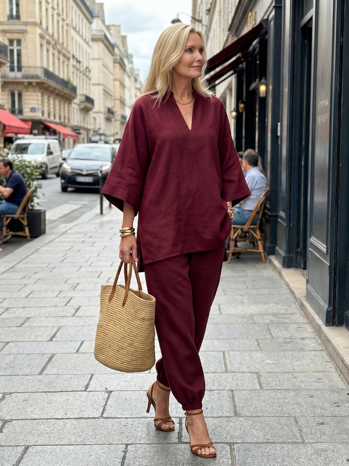 Comfortable women's two-piece set with a relaxed V-neck tunic and gathered trousers.