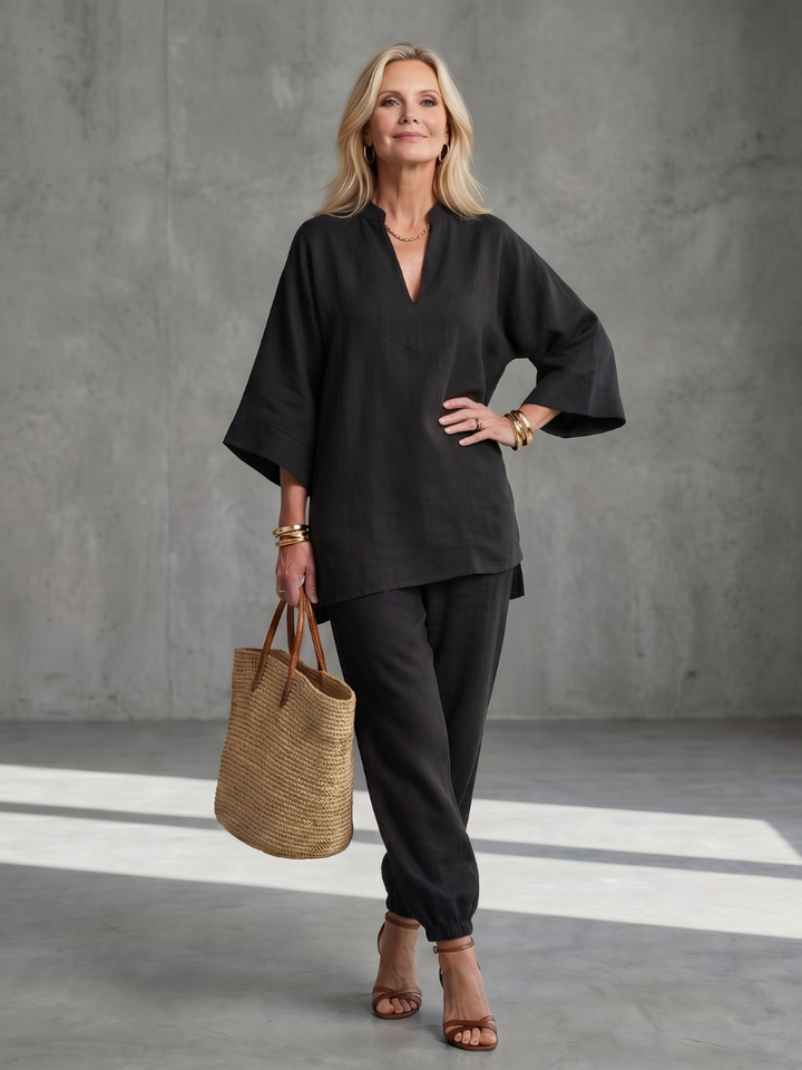 Fashionable women's relaxed fit V-neck tunic & gathered trouser two-piece set.
