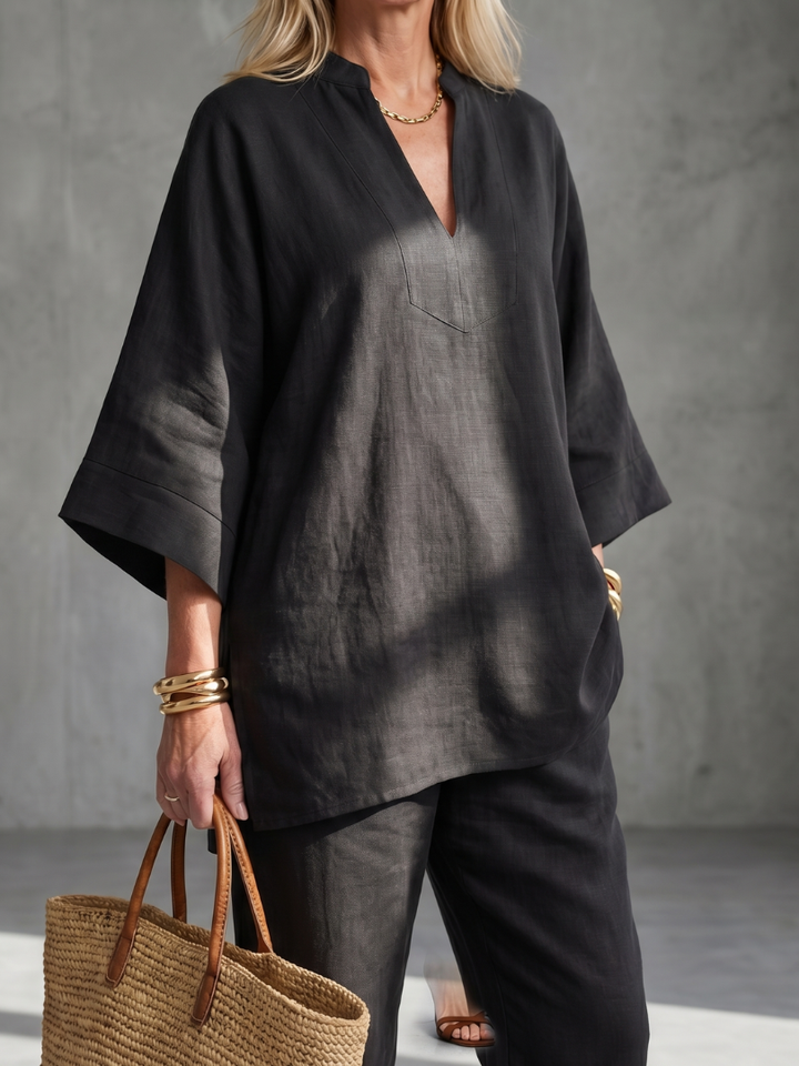 Women's elegant lounge wear: relaxed fit V-neck tunic & gathered trousers.