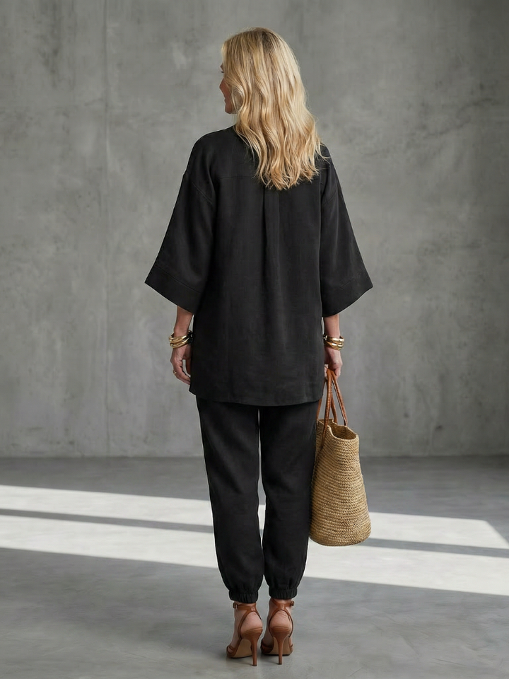 Stylish women's summer two-piece set: V-neck tunic and comfortable gathered trousers.