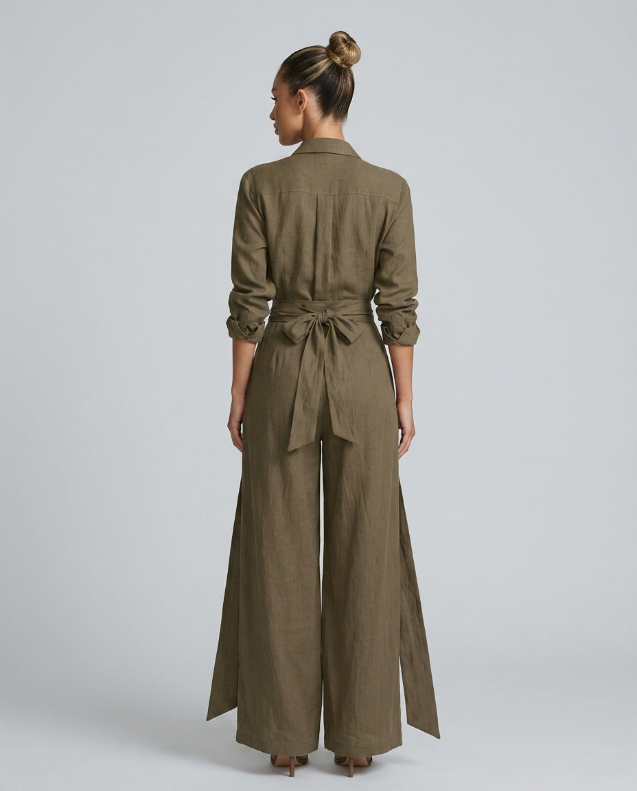 Elegant women's one-piece relaxed wide leg jumpsuit with practical button-front closure.