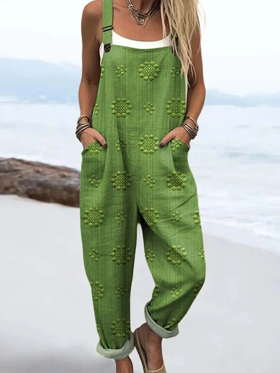 Boho chic women's wide-leg jumpsuit, relaxed fit, ideal for travel or beach day comfort. Adjustable straps.