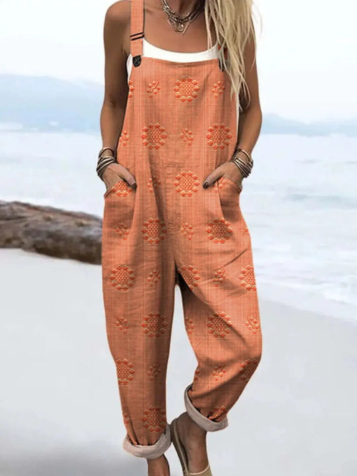 Effortless women's wide-leg jumpsuit, relaxed and comfy with adjustable straps & side pockets for daily wear.