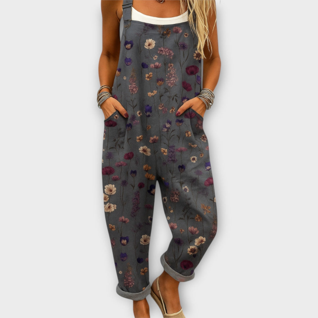 Women's retro elegant floral print wide-leg jumpsuit with pockets, perfect for summer casual wear or a chic vintage look.