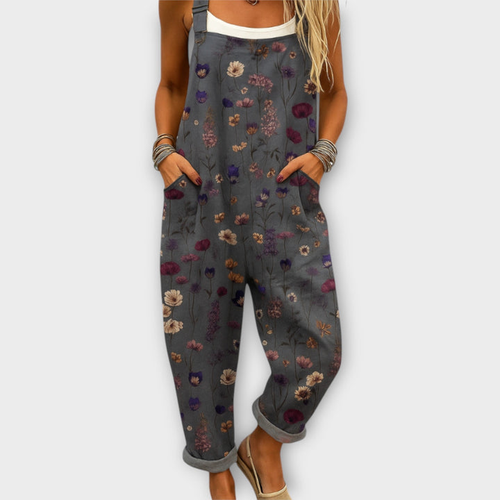 Women's retro elegant floral print wide-leg jumpsuit with pockets, perfect for summer casual wear or a chic vintage look.