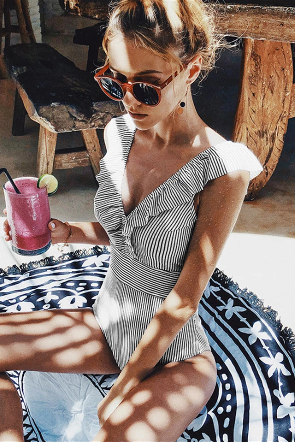 Women's retro striped one-piece swimsuit, perfect for summer beachwear & pool, classic flattering style.