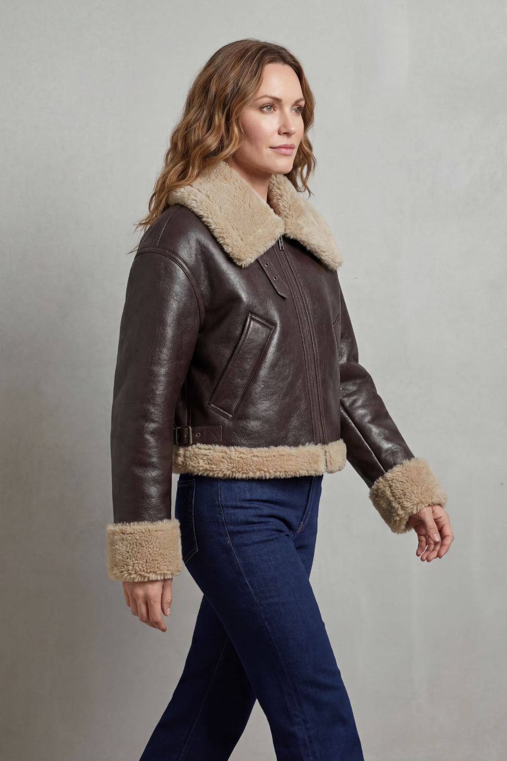 Modern women's reversible aviator jacket, cropped cut perfect for versatile layering fashion.