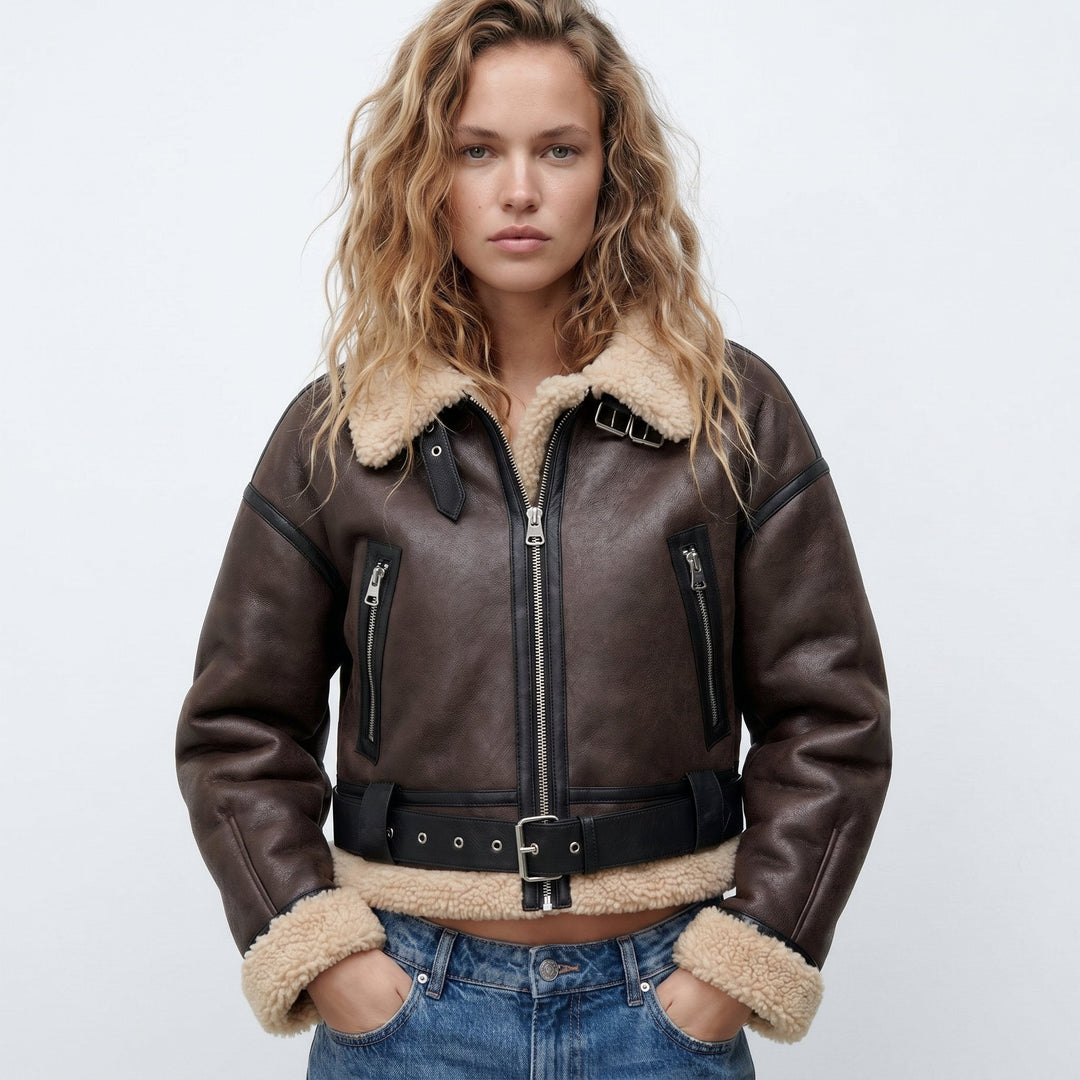 Women's reversible shearling bomber jacket, cozy winter outerwear in a chic casual style.