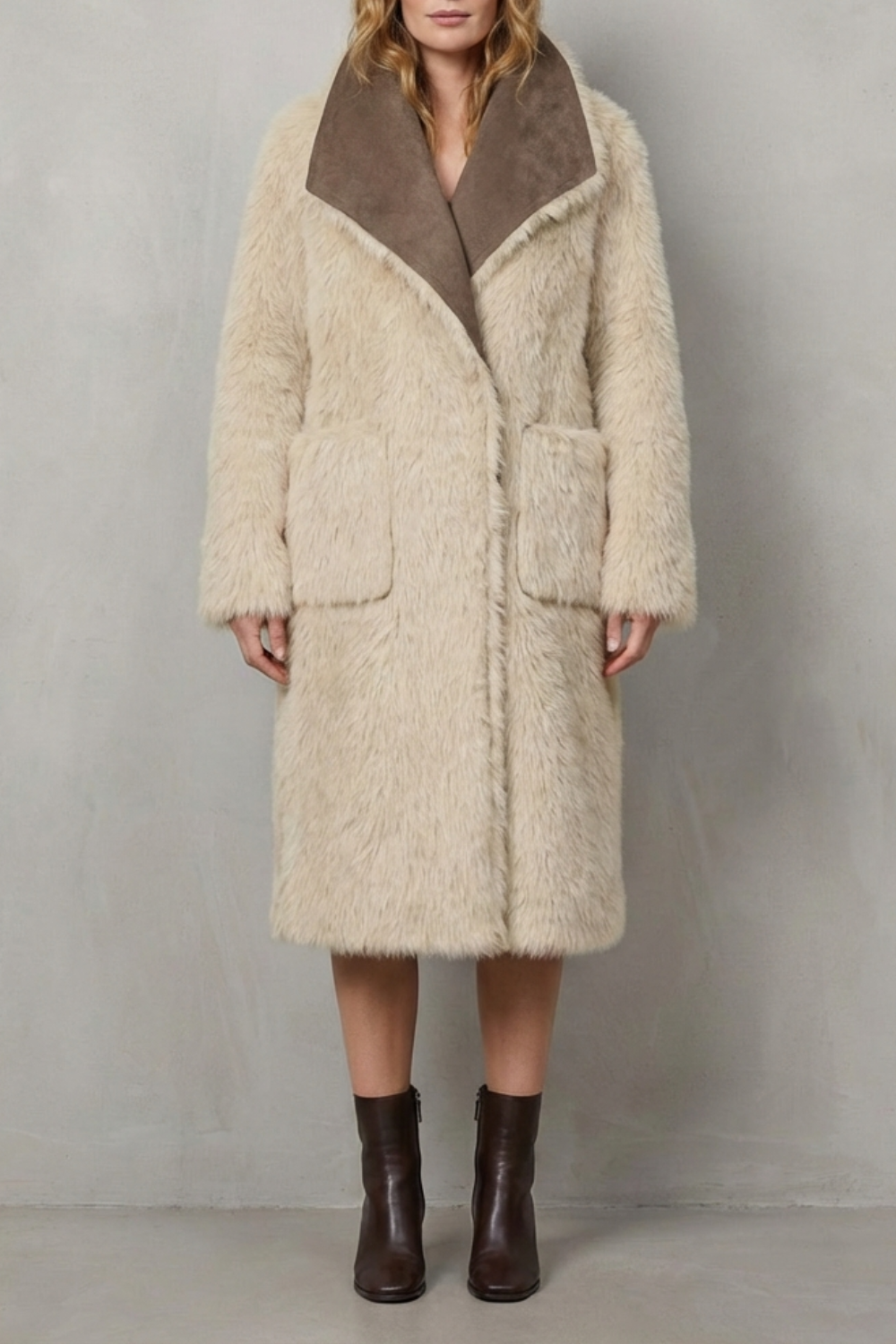 Textured reversible women's winter coat, offering warmth and two stylish looks for cold weather.
