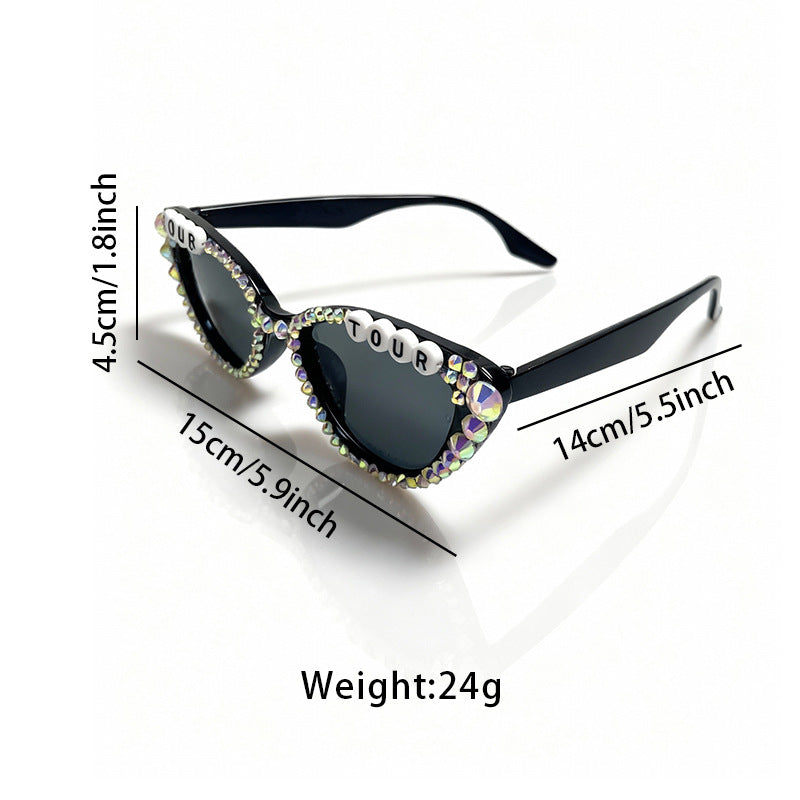 Glamorous women's cat-eye sunglasses adorned with rhinestones, perfect for fashion-forward style.