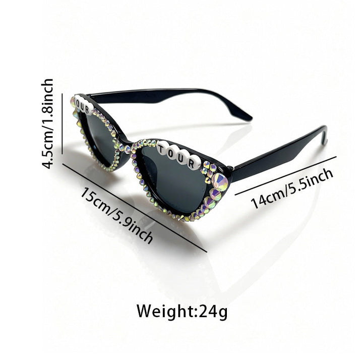 Glamorous women's cat-eye sunglasses adorned with rhinestones, perfect for fashion-forward style.