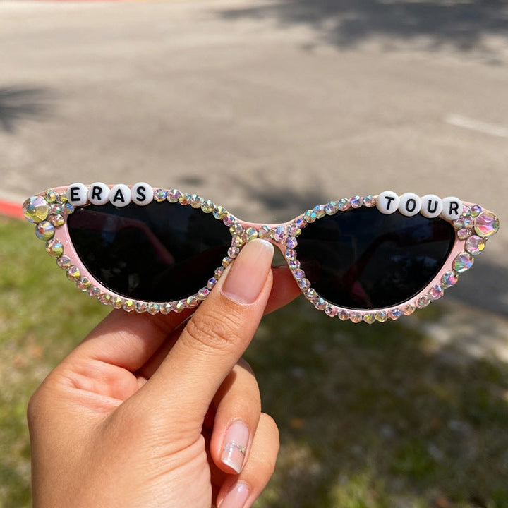 Chic women's rhinestone cat-eye sunglasses, a glamorous accessory with essential UV protection.