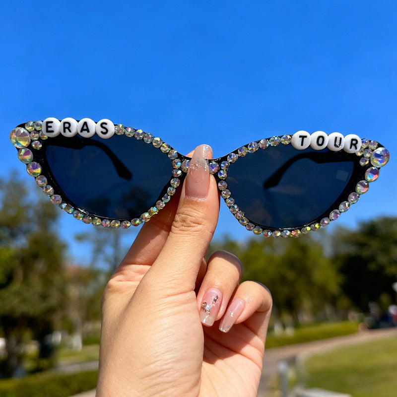 Premium women's cat-eye sunglasses featuring dazzling rhinestones and reliable UV defense.