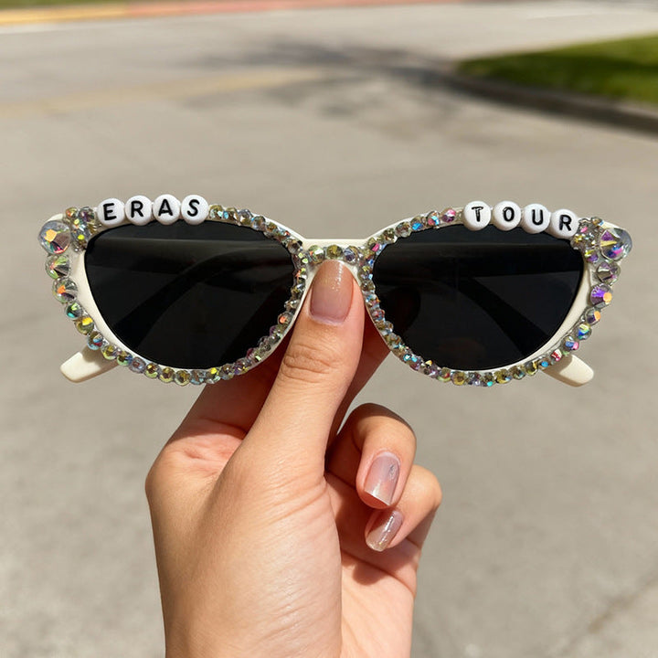Fashionable women's rhinestone cat-eye eyewear, combining glamorous aesthetics with practical UV protection.