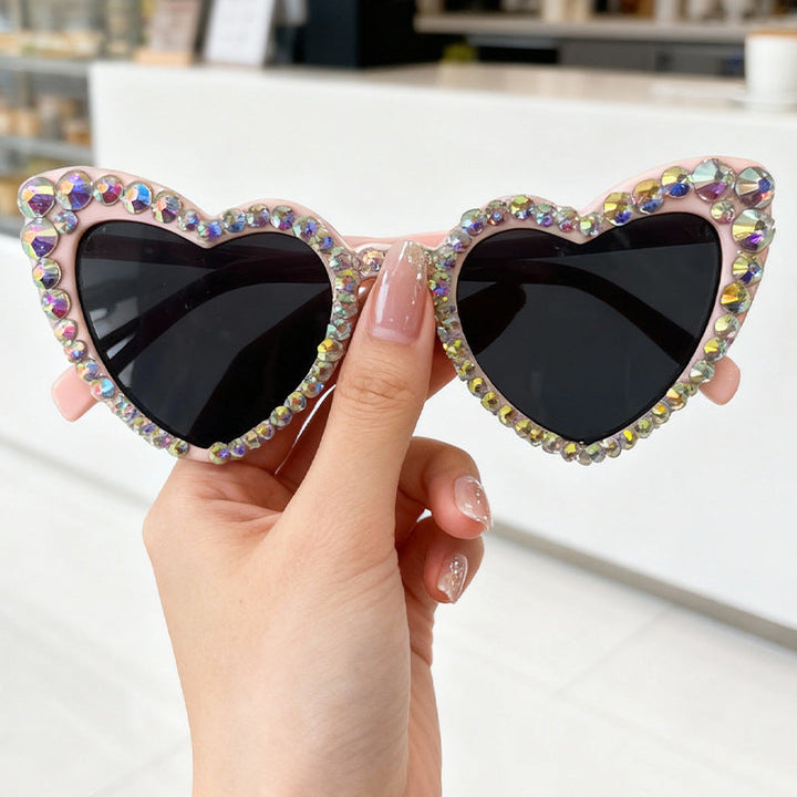 Pretty women's heart sunglasses, UV protected lenses, elegant rhinestone design eyewear.