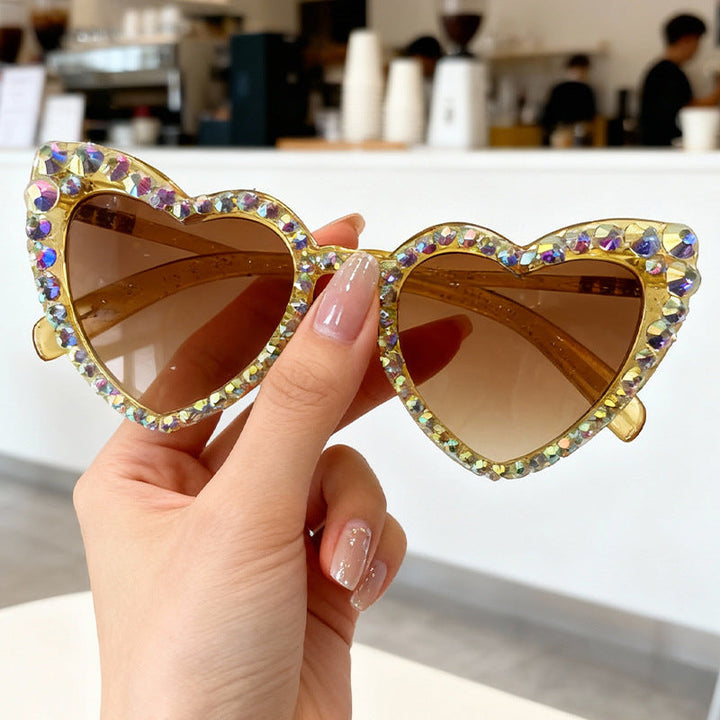 Women's glamorous rhinestone heart sunglasses, perfect for beach with reliable UV protection.