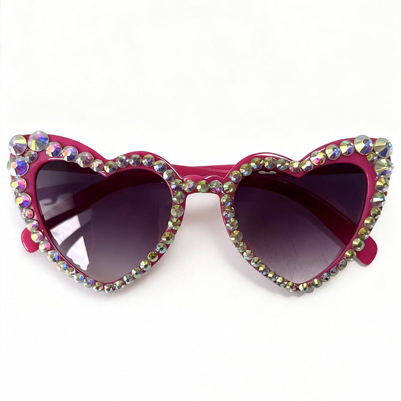 Fashionable women's heart sunglasses, full UV protection, embellished with dazzling rhinestones.