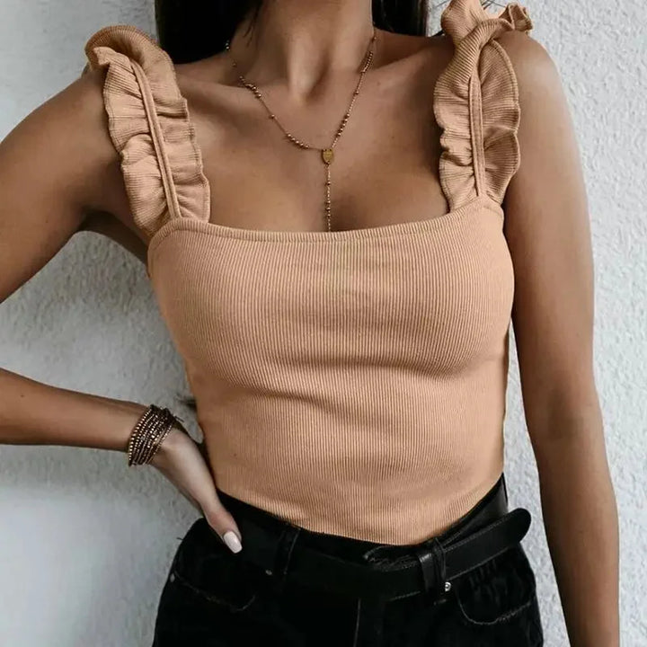 Versatile women's square-neck ribbed knit top. Sleeveless design with ruffled straps for comfortable, chic wear.