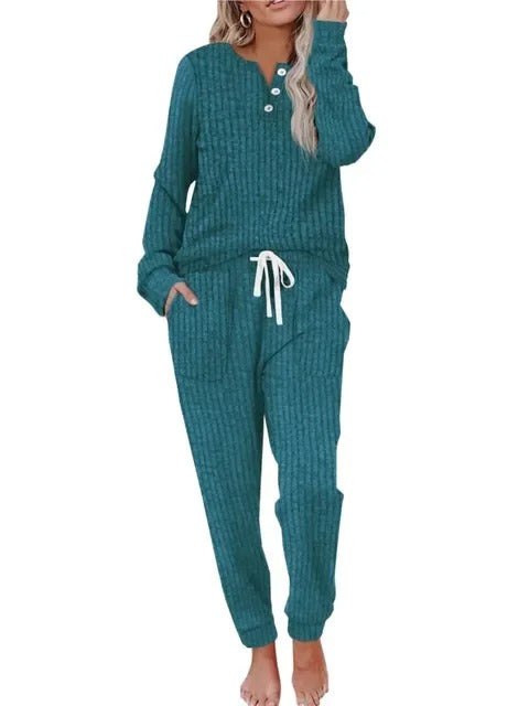 Women's ribbed loungewear set, cozy two-piece with button-neck top & drawstring jogger pants for comfort.