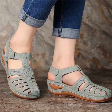 Comfortable women's Roman style sandals with adjustable straps & foot support for walking all day.