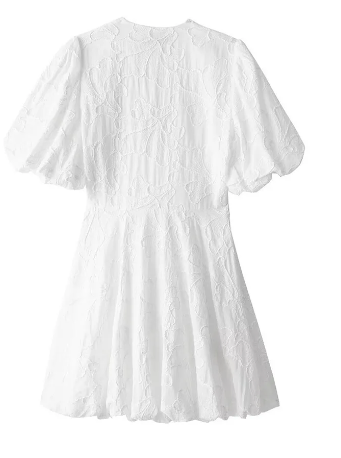 White women's mini dress with a lovely floral pattern. A romantic and elegant summer dress, great for any occasion.