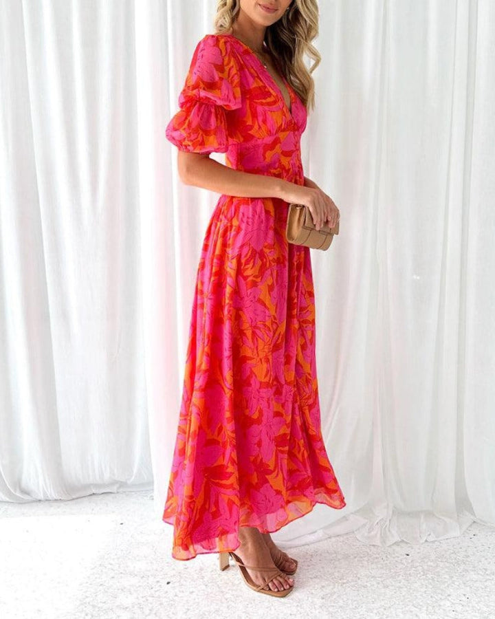 Dreamy women's maxi dress featuring elegant romantic puff sleeves. Perfect for summer fashion.