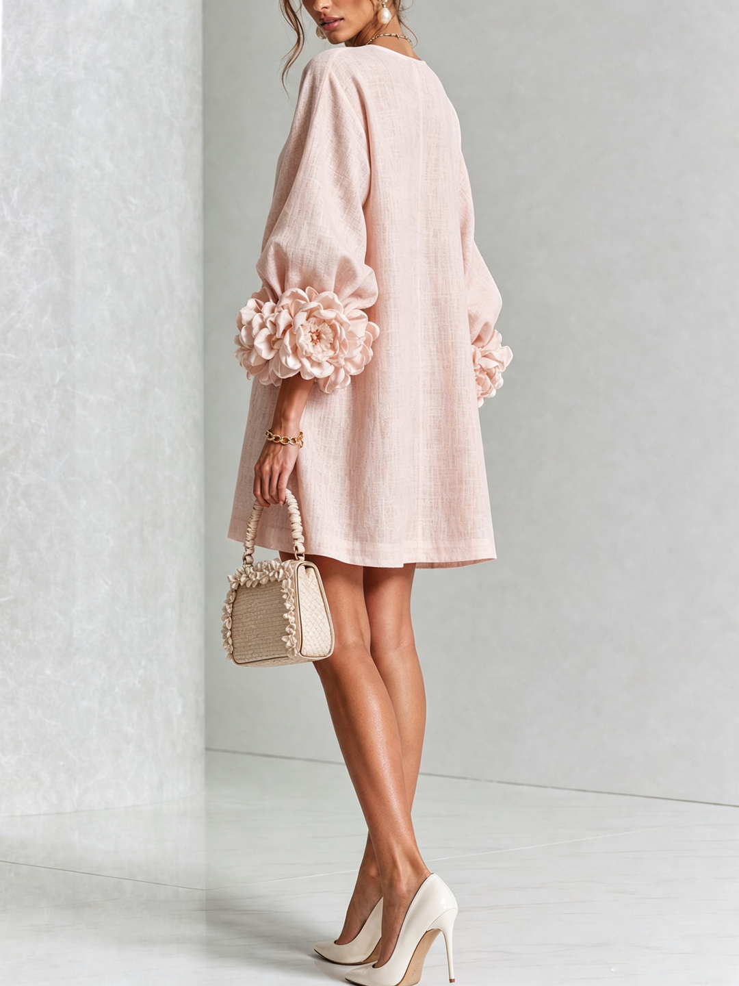 Button front long sleeve mini shift dress for women. Round neck, A-line silhouette.