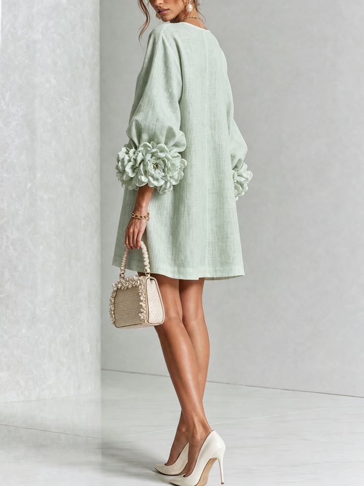 Women's A-line long sleeve mini dress with a round neck & beautiful button front details.