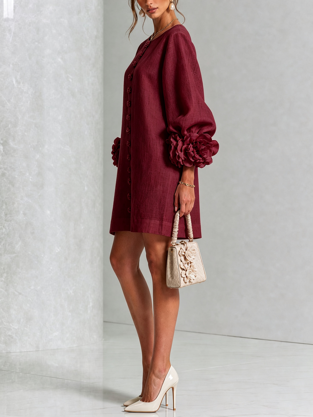 Women's button front mini shift dress, long sleeve, round neck, flattering A-line fit.
