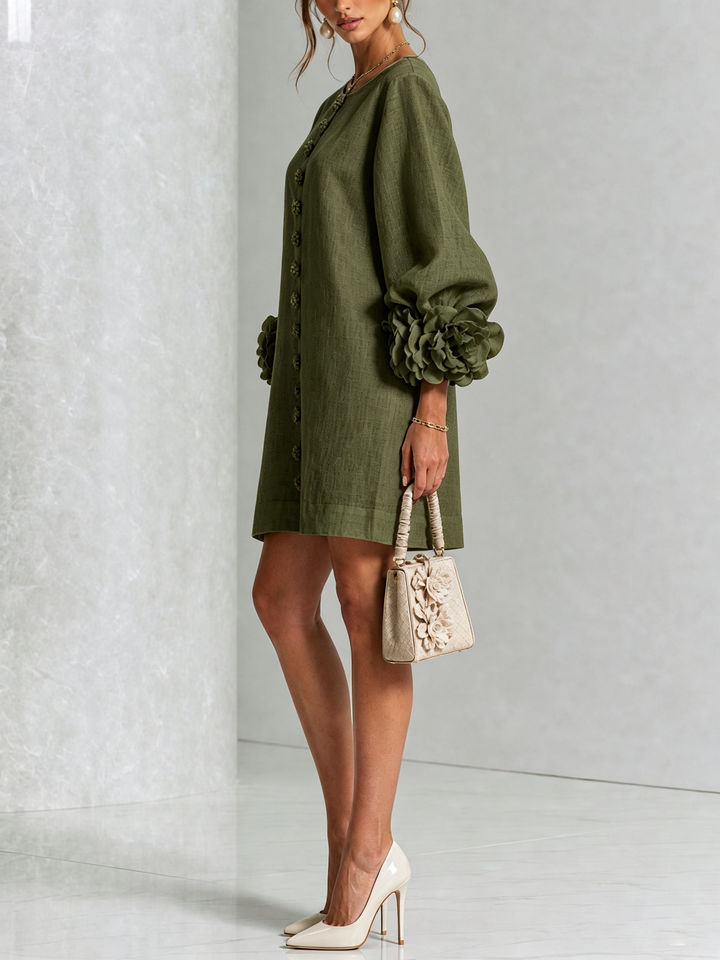 A-line mini shift dress with a round neck and long sleeves. Versatile women's everyday wear.