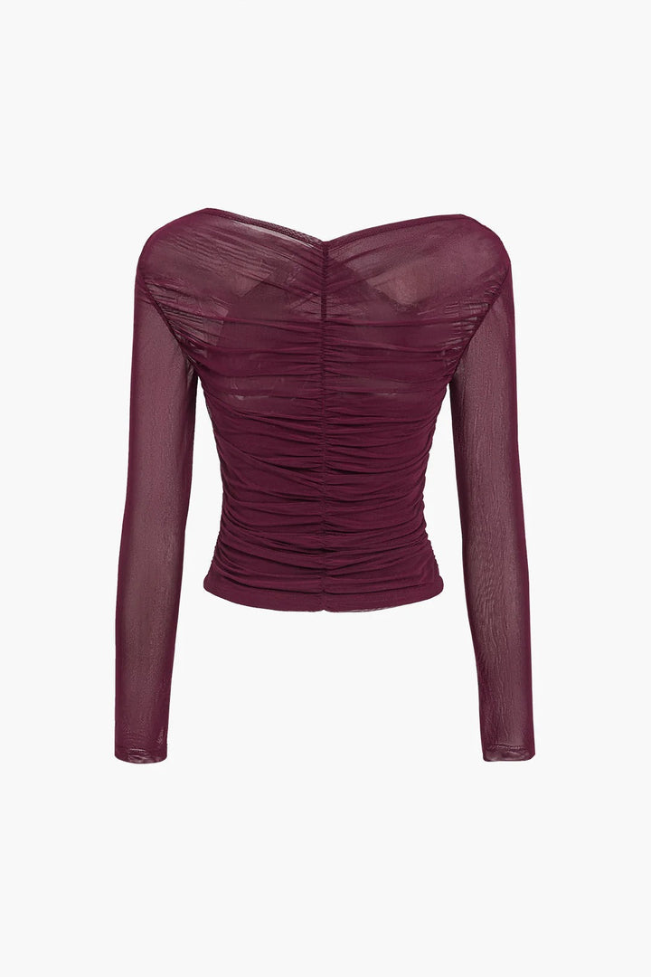 Versatile women's ruched top with long sheer sleeves and a stylish cross-front for a chic look.