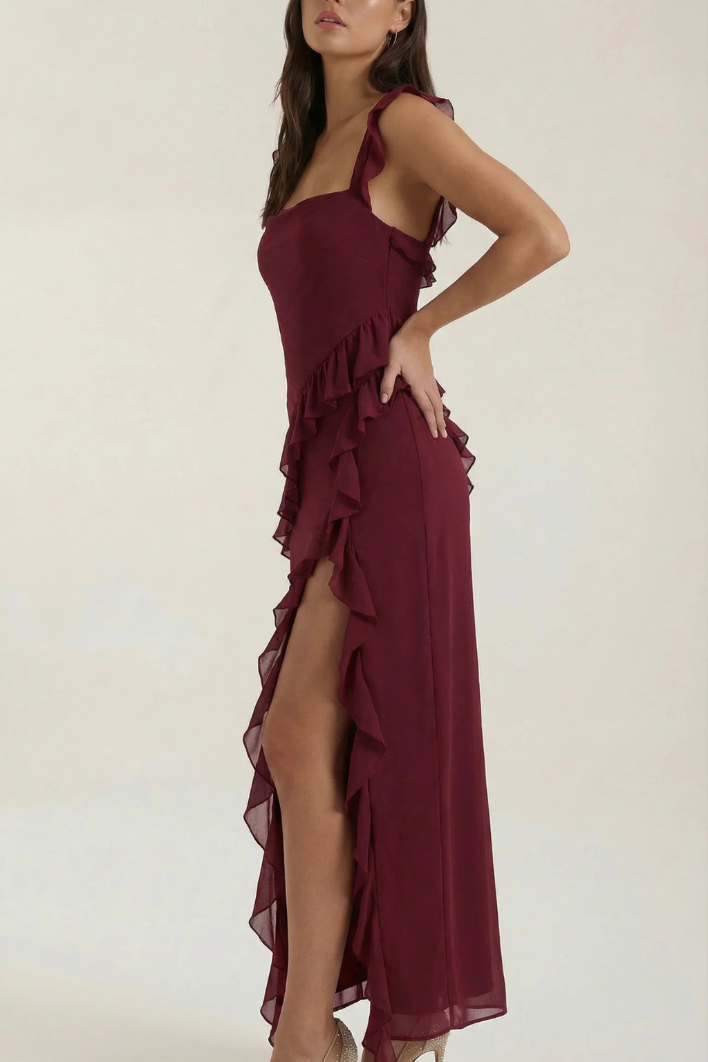 Modern women's ruffle dress, knee-length with an elegant side slit, sophisticated & semi-formal.