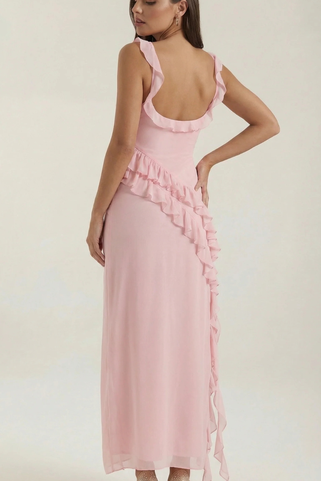 Elegant sleeveless ruffle dress for women, knee-length, ideal cocktail party wear with side slit.