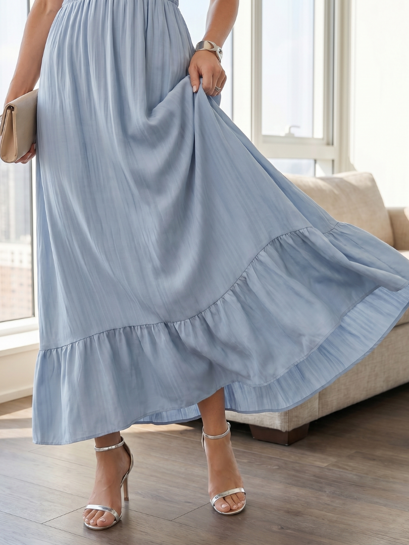 Casual summer women's midi dress with flowy tiered skirt, ruffle sleeves, and smocked waist.