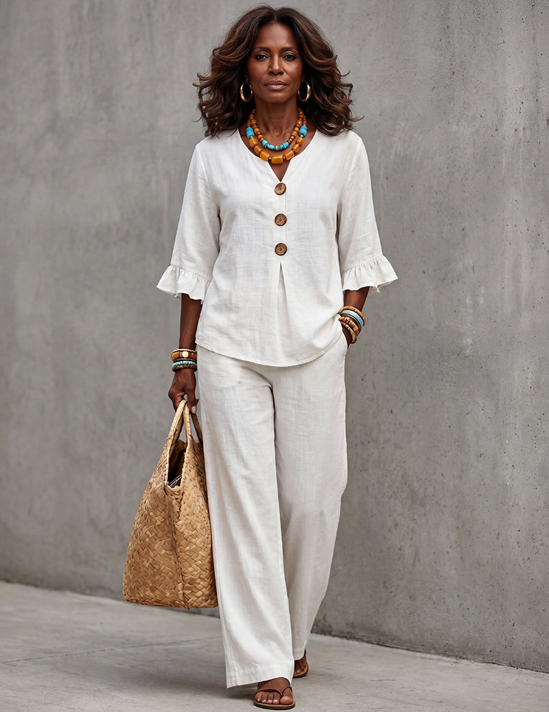 Casual chic women's outfit set: a ruffle sleeve top and stylish wide leg trousers for versatile summer fashion.