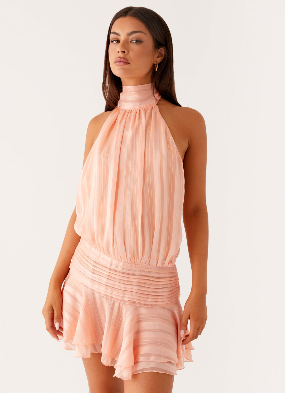 Flowy ruffled halter mini dress for women, an elegant and comfortable party or summer outfit.