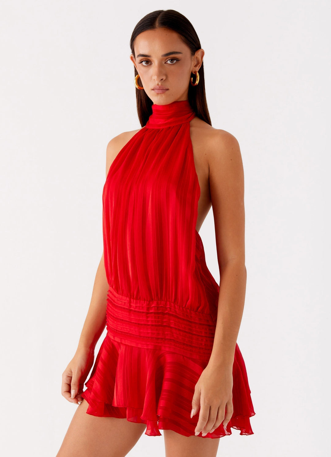 Beautiful women's ruffled halter neck mini dress, a chic and versatile choice for parties and special moments.