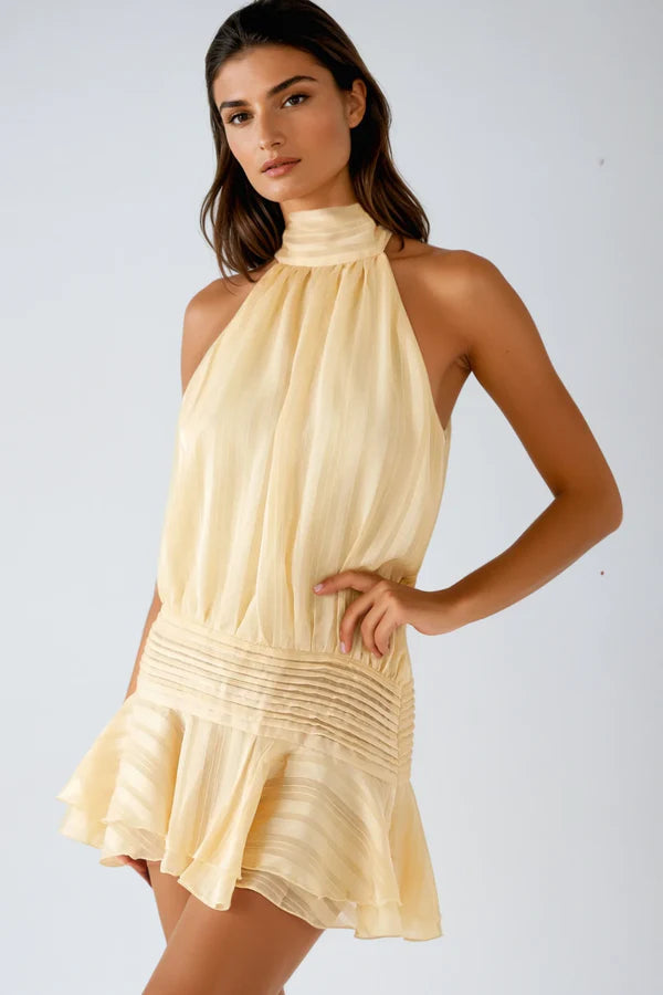 Elegant blue halter mini dress with ruffles, ideal for women's cocktail parties and summer events.