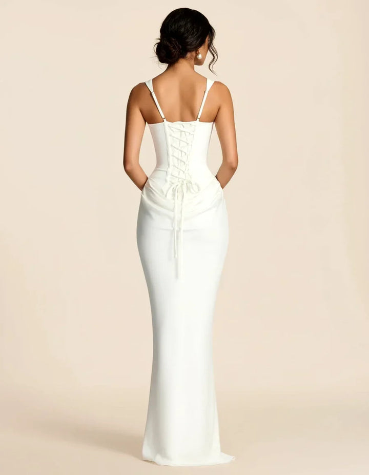 Modern women's midi dress with sculpted silhouette, ideal for versatile day to night & sophisticated events.