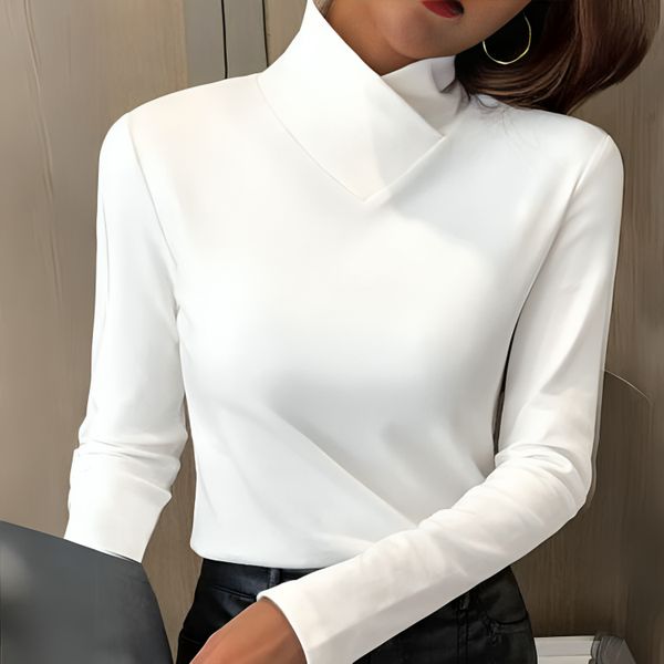 Women's sculpted soft-touch knit turtleneck top, elegant & versatile. Comfortable long sleeve for autumn/winter layering.