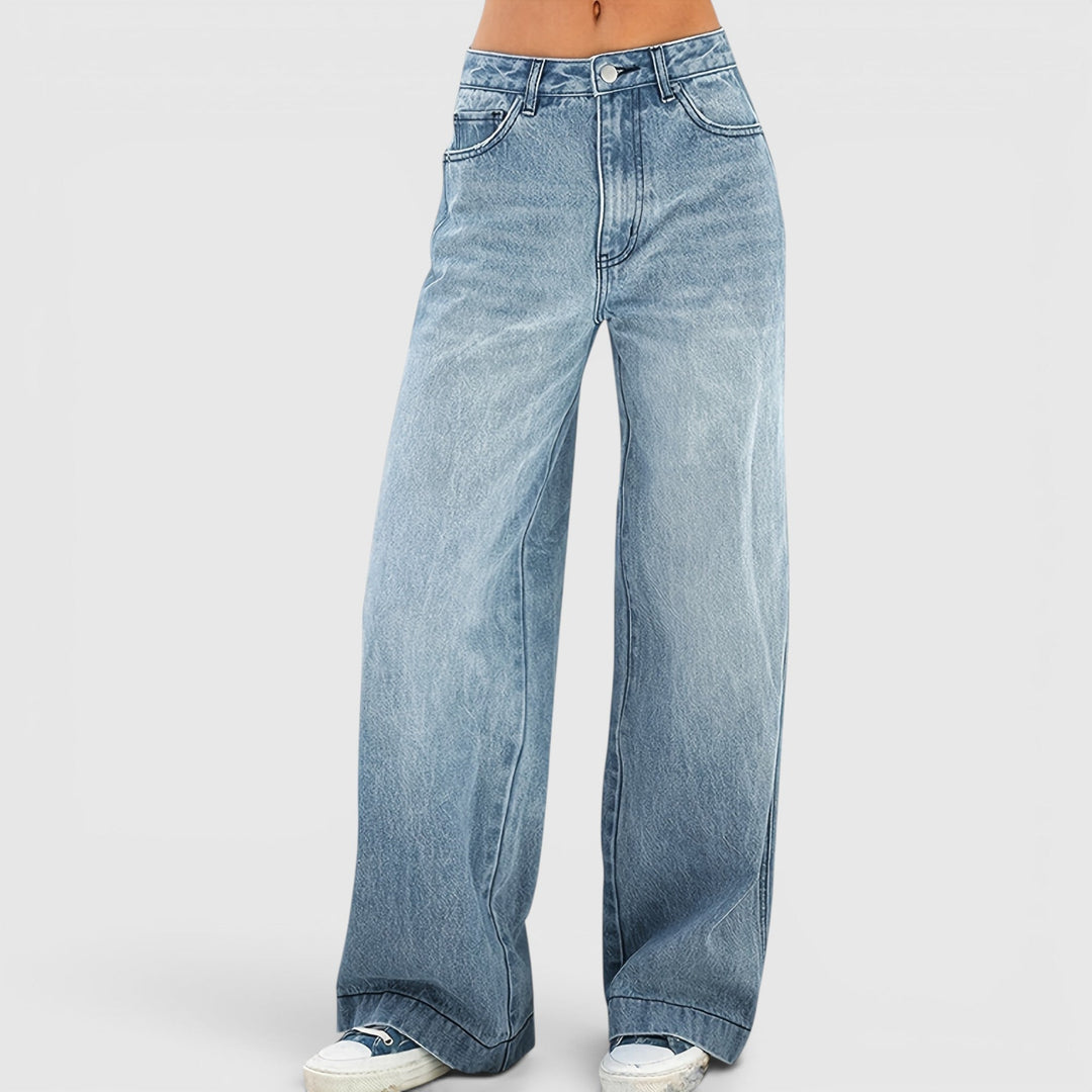 Women's sea blue baggy jeans with a loose, wide leg fit for comfortable everyday streetwear fashion.