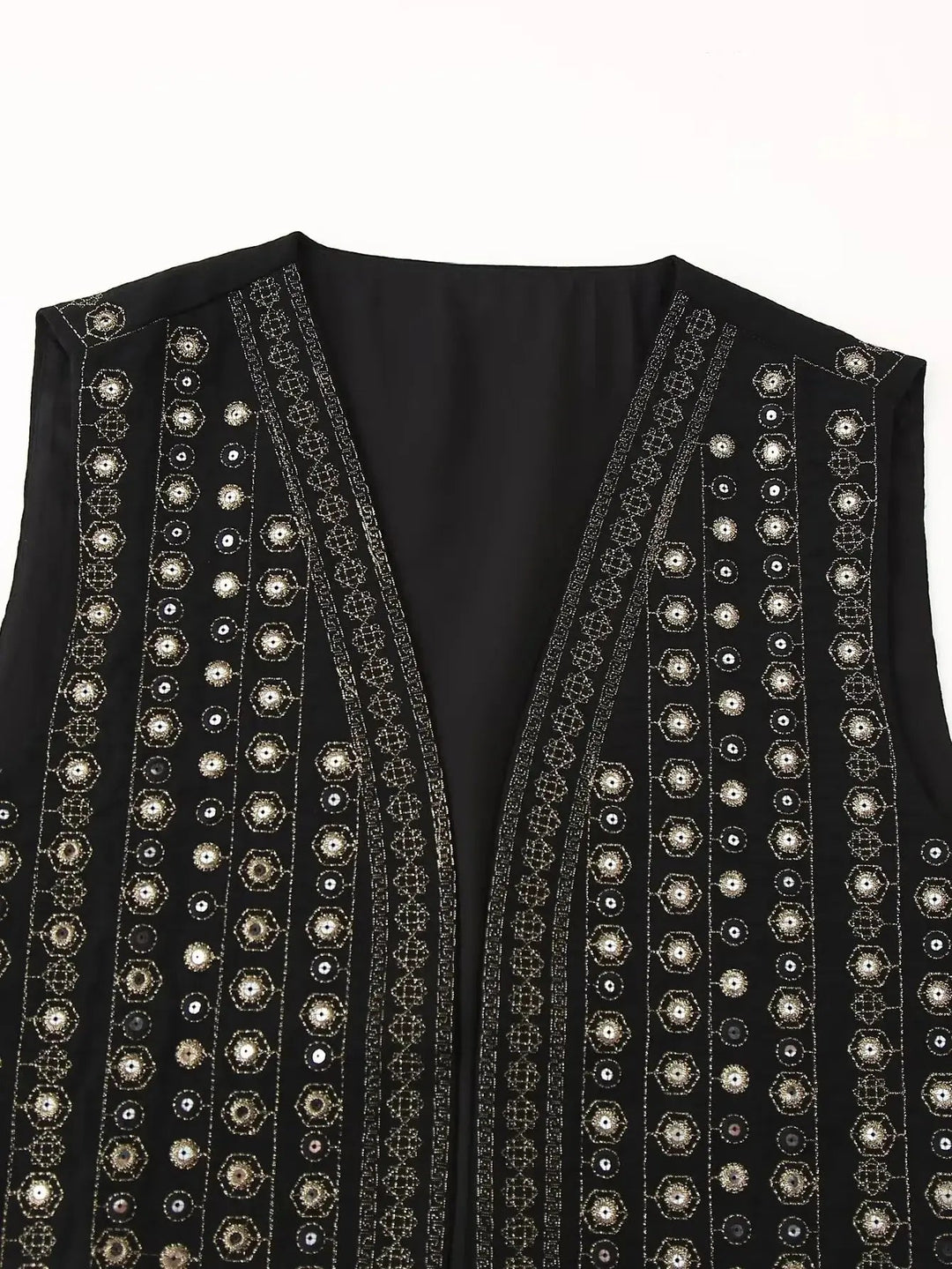 Statement women's sequin embroidered boho vest. Vibrant festival wear, sleeveless bohemian style for layering.
