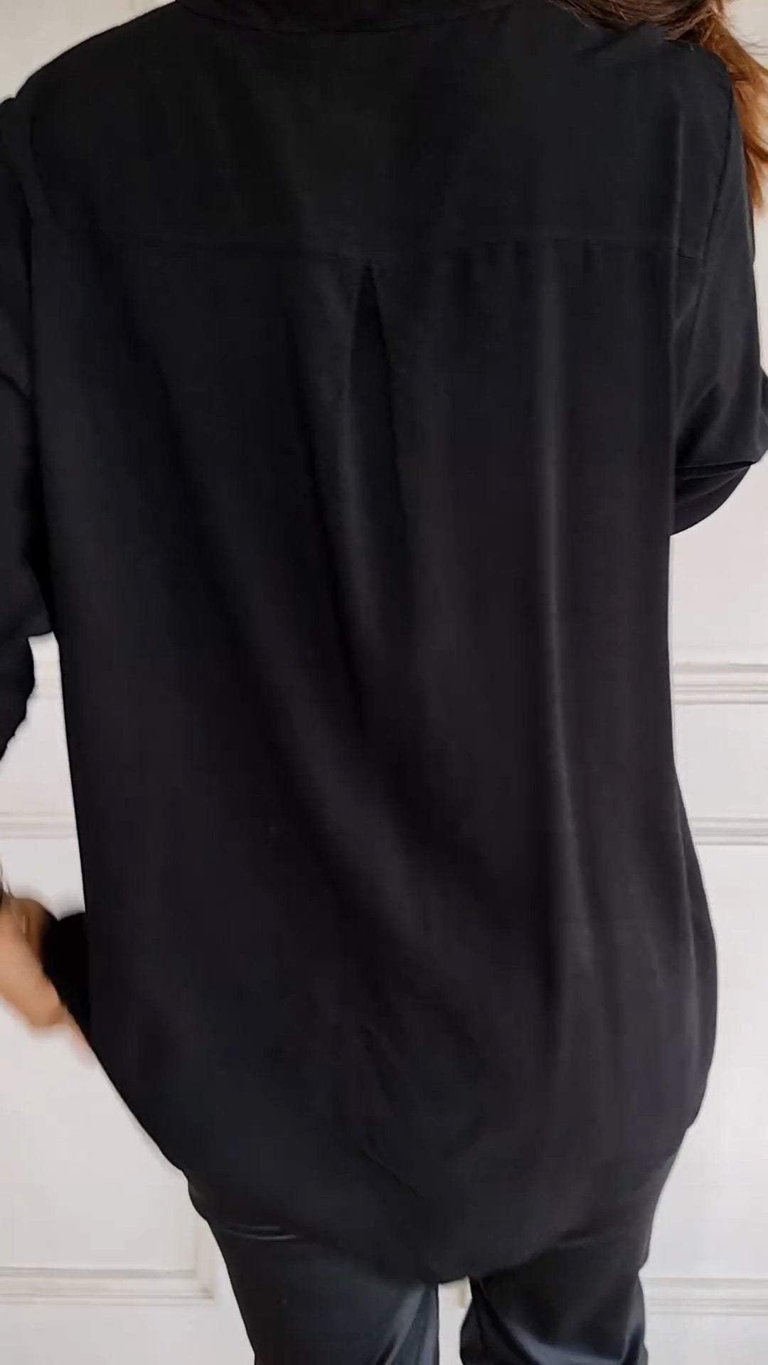 Fashion-forward women's sequin trim button-up shirt, a shimmering and stylish top for modern wardrobes.