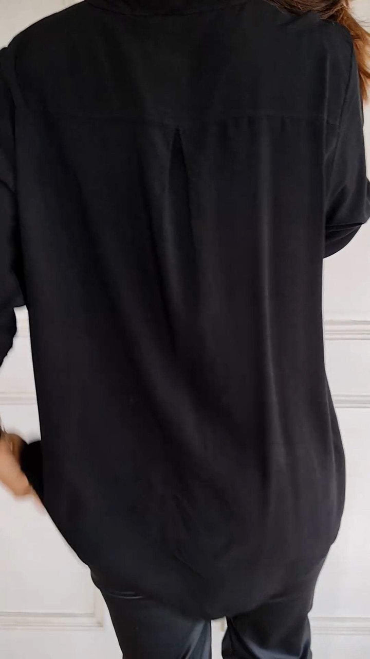 Fashion-forward women's sequin trim button-up shirt, a shimmering and stylish top for modern wardrobes.