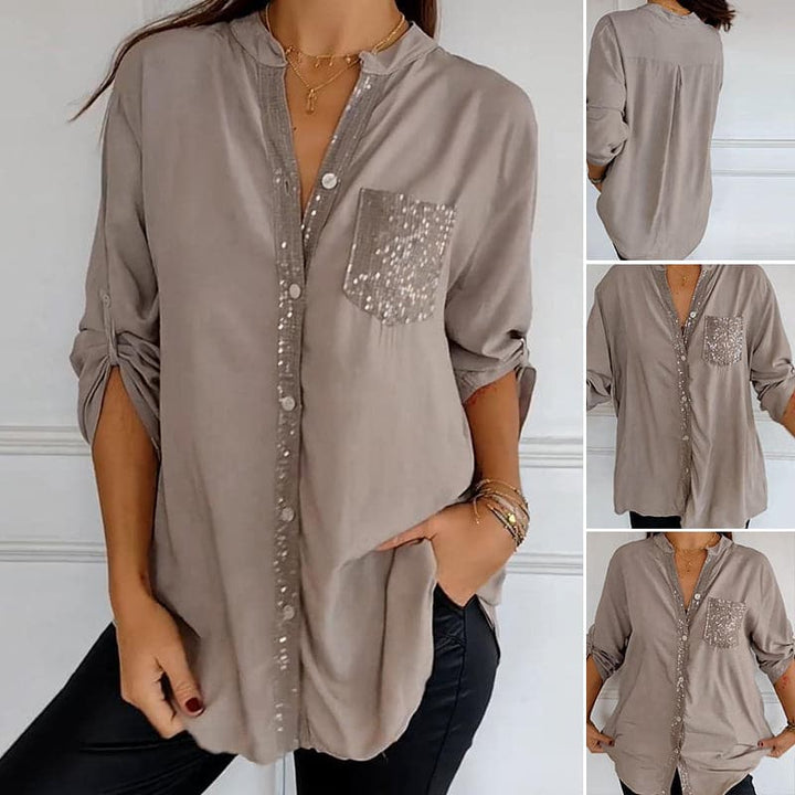 Sparkling women's button-up shirt with sequin details, ideal for evening wear or a chic fashion statement.
