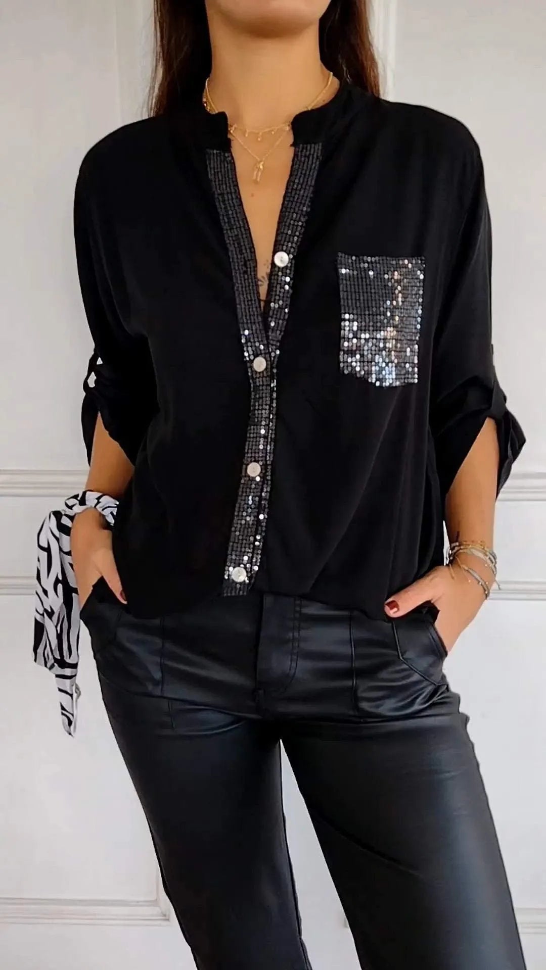 Versatile women's sequin trim button-up top, an elegant blouse for both casual and evening wear.