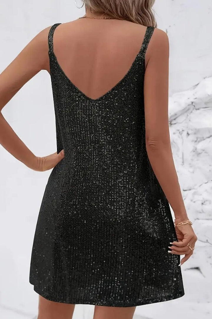 Festive women's sequin V-neck mini dress, sleeveless, perfect for New Year's Eve or a special celebration.