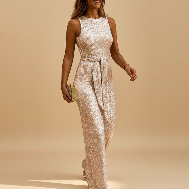 Glamorous women's sequin wide leg jumpsuit with a chic waist tie, ideal for formal & special occasions.