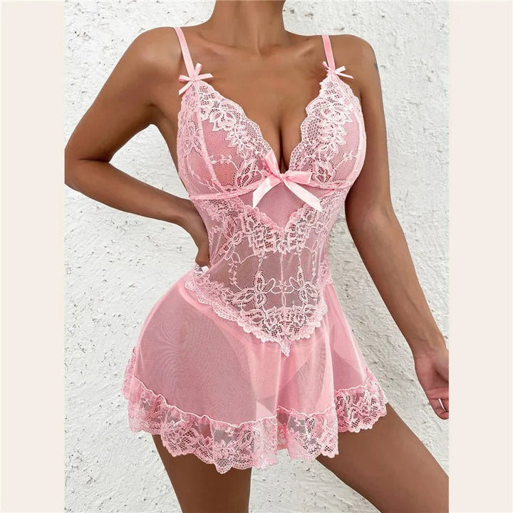 Women's sheer floral lace chemise with delicate scalloped hem, perfect romantic nightwear.