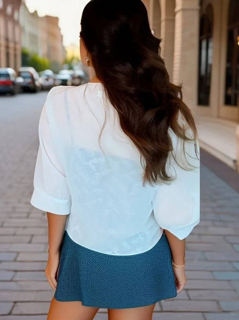 Versatile women's sheer blouse with 3/4 sleeves, open-front design, and a chic tie-front.